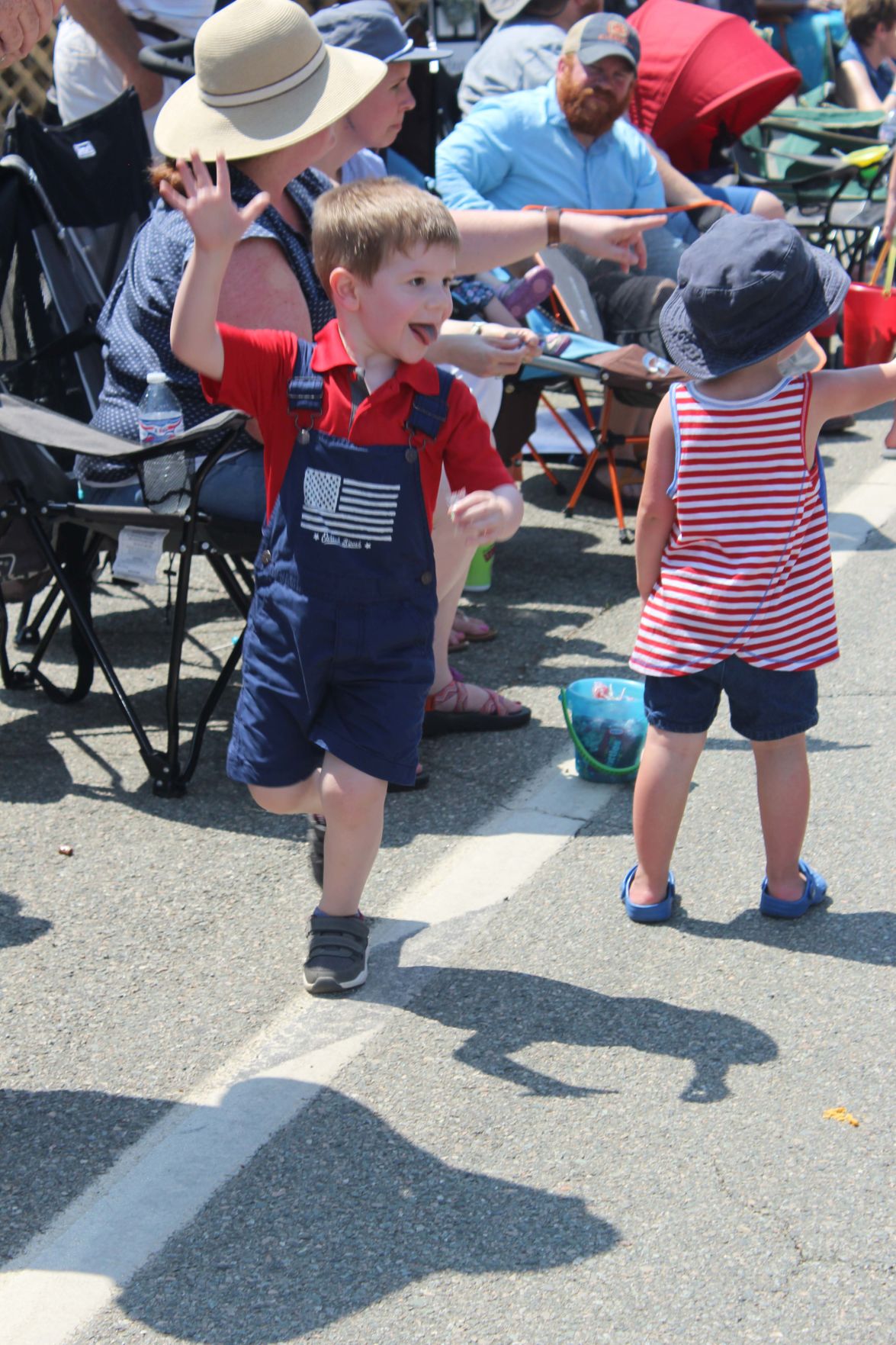 Liam Seamster waving at parade.jpg